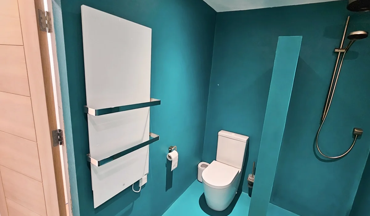 Select XLS Towel Heater White installed in modern bathroom