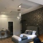 Herschel Select XL White panels ceiling mounted in a bedroom